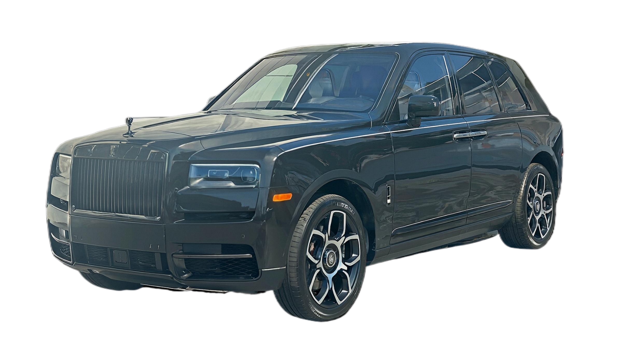 Rolls Royce Cullinan for hire with private chauffeur in Long Island arriving at a luxury Long Island destination